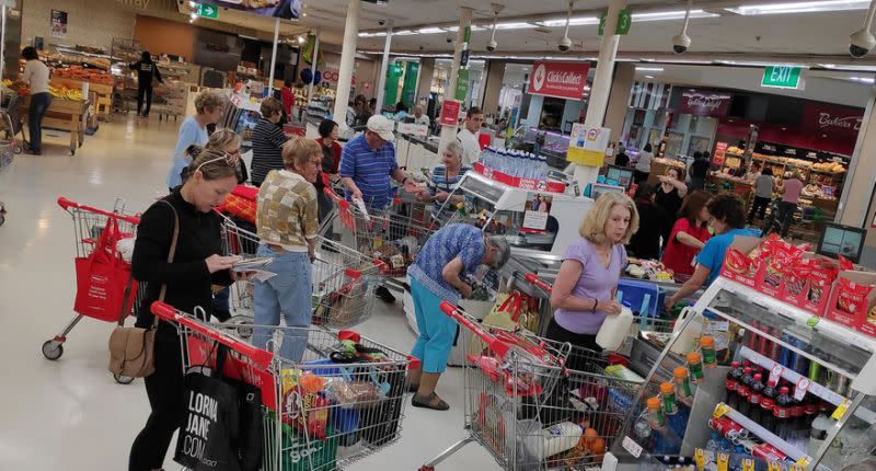 A queue forms at Coles self-serve checkouts at Southlands Boulevarde shopping mall in Willetton.