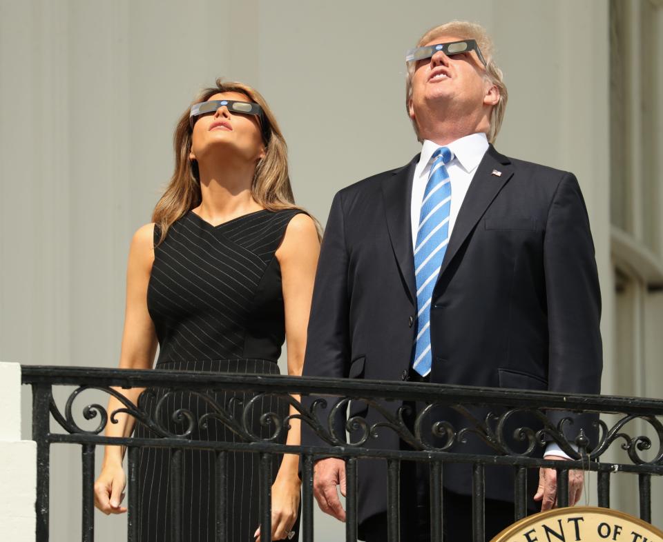 President Trump and first lady Melania Trump joined millions of other Americans who wore protective glasses as they viewed a solar eclipse on Aug. 21, 2017.