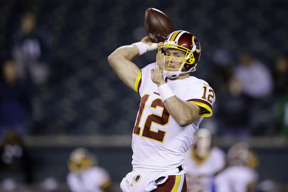 Washington Redskins' Colt McCoy warms up before an NFL football game against the Philadelphia Eagles, Monday, Dec. 3, 2018, in Philadelphia. (AP Photo/Matt Rourke)