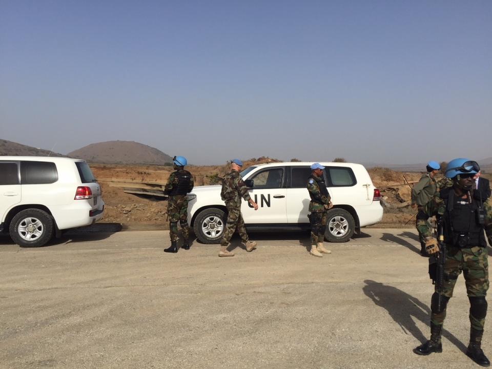 UN soldiers attend the Syria-Israel Quneitra border crossing, in the Golan Heights, in Quneitra, Syria, Monday, Oct. 15, 2018. The Quneitra crossing will only be opened for the U.N. observers for now, who have been stationed there to monitor a cease-fire between the two countries since 1974. (AP Photo)