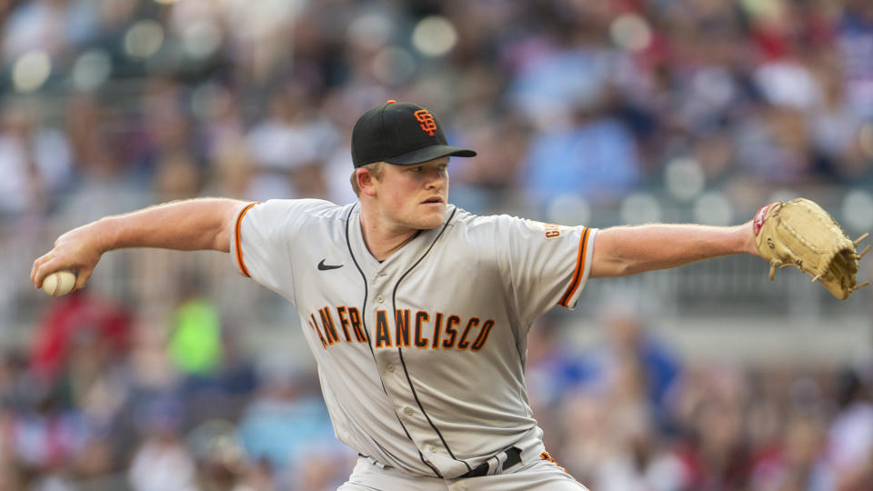 San Francisco Giants starting pitcher Logan Webb throws in the first inning of a baseball game against the Atlanta Braves, Monday, June 20, 2022, in Atlanta. (AP Photo/Hakim Wright Sr.)