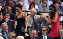 Victoria Beckham (left) and Tana Ramsey in the royal box on day thirteen of the Wimbledon Championships at The All England Lawn Tennis and Croquet Club, Wimbledon.