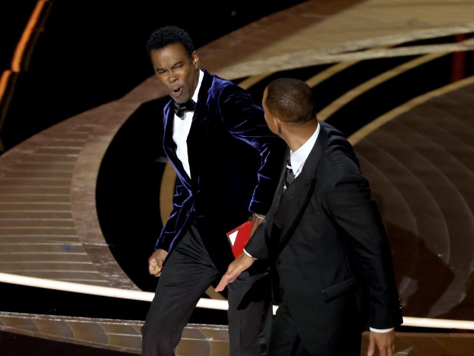 Will Smith appears to slap Chris Rock onstage during the 94th Annual Academy Awards at Dolby Theatre on March 27, 2022 in Hollywood, California.