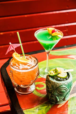 <p>LISA CORSON</p> Indochineâ€™s cocktails are served in funky glassware and spotlight tropical fruit flavors