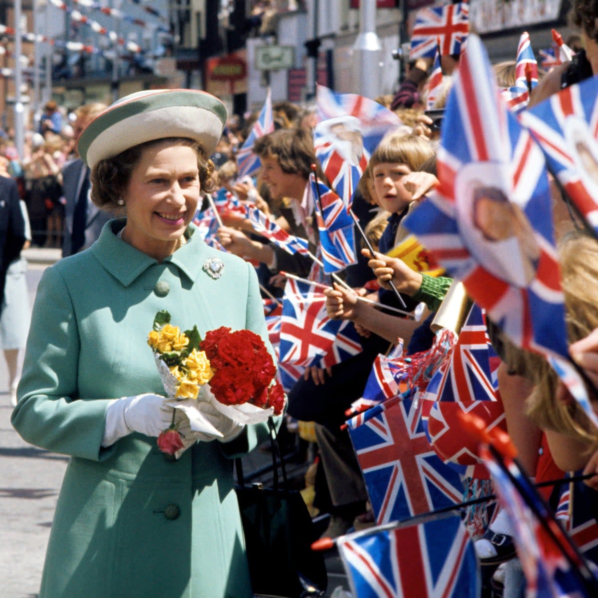 Queen Elizabeth II on a walk-about in Portsmouth during her Silver Jubilee tour of Great Britain, 1977 (PA)