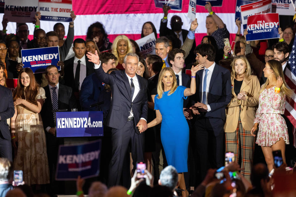BOSTON, MA - APRIL 19: Robert F. Kennedy Jr. and his wife Actress Cheryl Hines wave to supporters on stage after announcing his candidacy for President on April 19, 2023 in Boston, Massachusetts. An outspoken anti-vaccine activist, RFK Jr. joins self-help author Marianne Williamson in the Democratic presidential field of challengers for 2024. (Photo by Scott Eisen/Getty Images) (Scott Eisen / Getty Images)