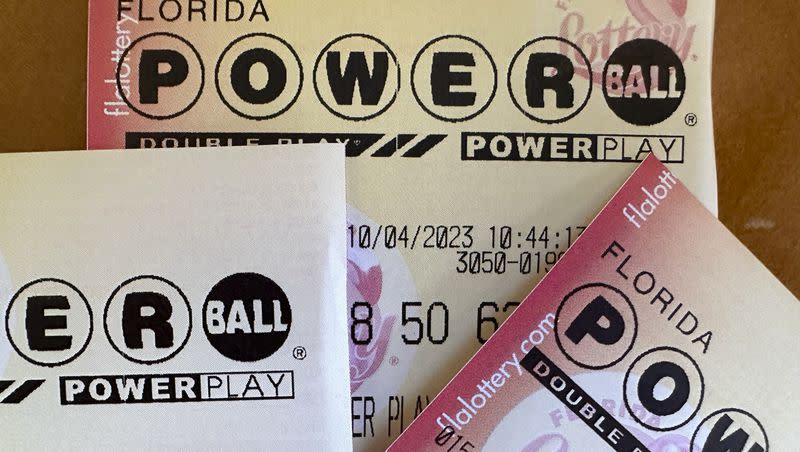 Powerball lottery tickets are displayed Oct. 4, 2023, in Surfside, Fla. Someone in Michigan has won an $842.4 million Powerball jackpot on the first day of 2024, the first time it has been won on New Year’s Day since the game’s start in 1992.