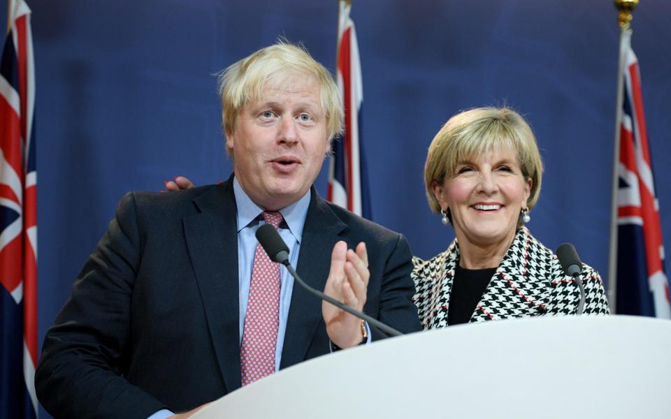 Boris Johnson and Australian Foreign Minister Julie Bishop attend a joint press conference  - Credit:  AAP