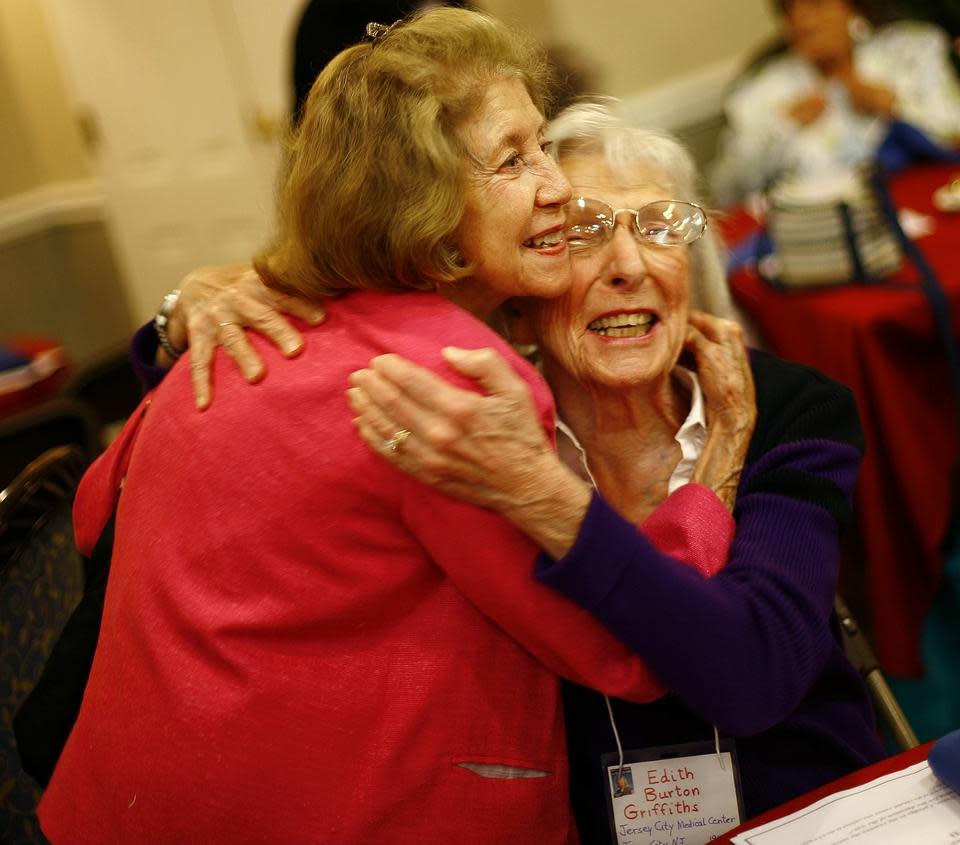Jean Demers Cyr of Scituate and Edith Burton Griffiths of Marshfield reunite at a Quincy luncheon in 2013 honoring the local women who served in the U.S. Cadet Nurse Corps during WWII. Both joined up in 1943.
