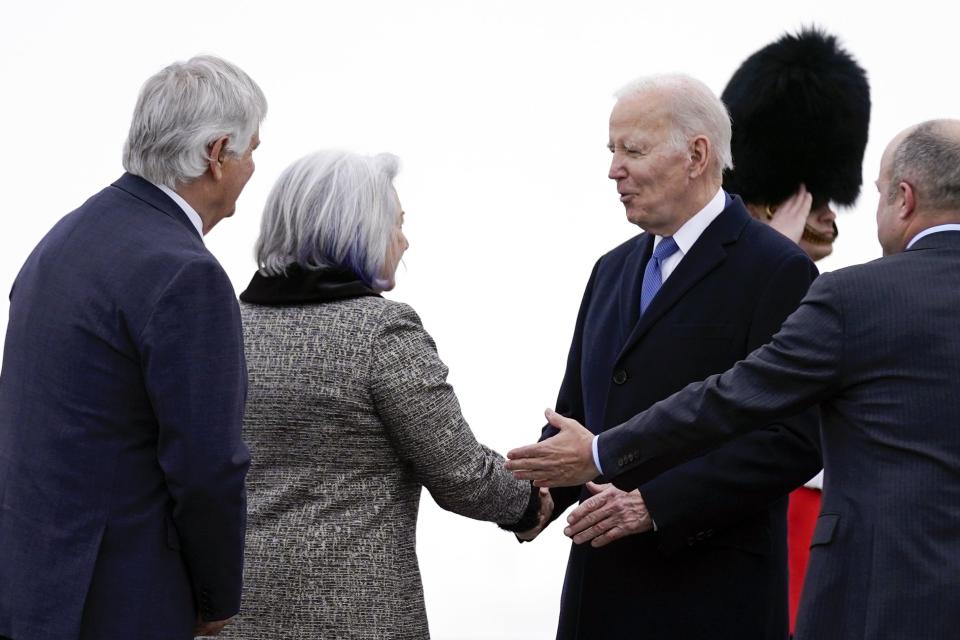 President Joe Biden greets Canada’s Gov. Gen. Mary Simon and her husband Whit Fraser as he arrives at Ottawa International Airport, Thursday, March 23, 2023, in Ottawa, Canada. 
