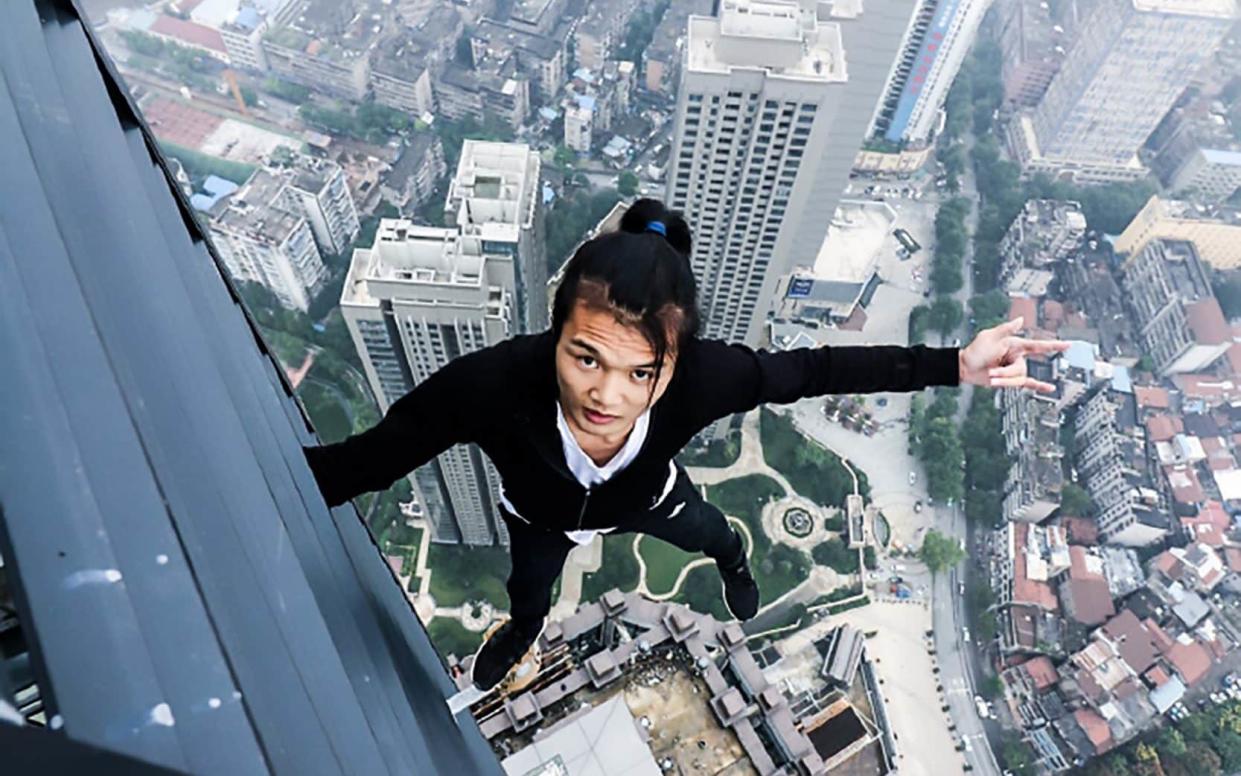 Wu Yongning was known for his daring feats on tall buildings - AsiaWire