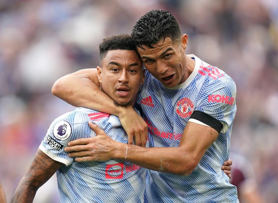 Lingard (left) celebrates scoring the winning goal with Ronaldo (PA Wire)