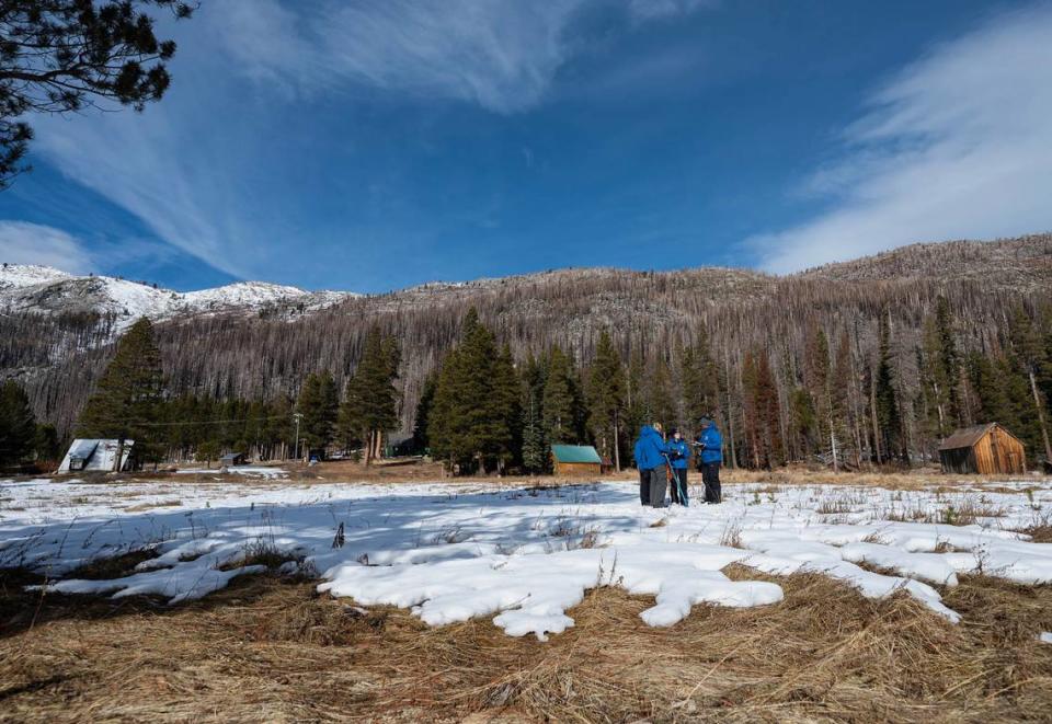 The Department of Water Resources snow survey team concludes its first survey at Phillips Station in El Dorado County on Tuesday.