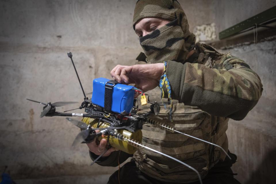 FILE - A Ukrainian soldier of the 71st Jaeger Brigade prepares a FPV drone at the frontline, near Avdiivka, Donetsk region, Ukraine, Friday, March 22, 2024. (AP Photo/Efrem Lukatsky, File)