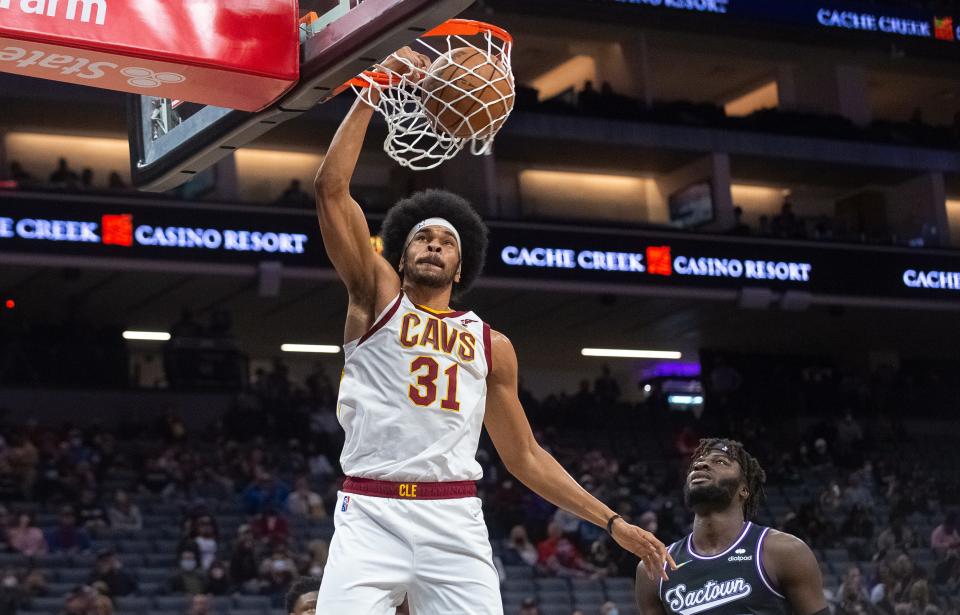 Cavaliers center Jarrett Allen (31) dunks against the Sacramento Kings in the first win of the Cavs' four-game road winning streak. [Randall Benton/Associated Press]