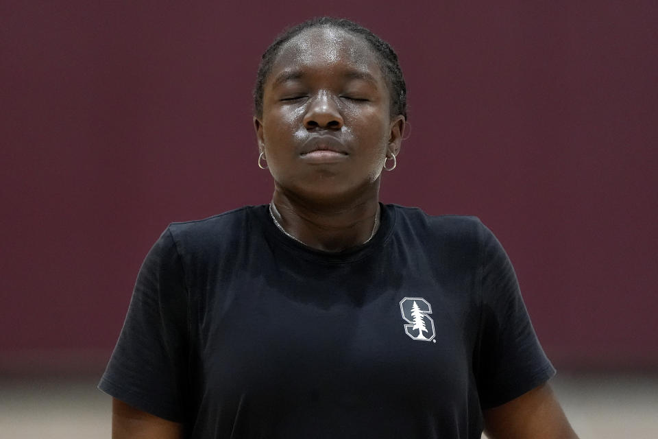 Shay Ijiwoye, who played basketball at Desert Vista High in Phoenix and has committed to Stanford University, works out Monday, March 18, 2024, in Chandler, Ariz. Iowa’s Caitlin Clark has reshaped women's college basketball and the perception of it. Up-and-coming players have taken notice, working to extend their range to be like her. (AP Photo/Matt York)