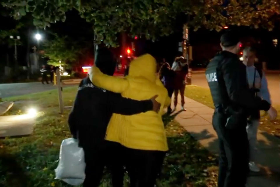 A bus dropped off asylum-seekers outside of Vice President Kamala Harris’ official residence in Washington on Thursday. (NBC 4 Washington)