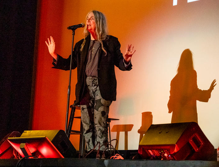 <p>Patti Smith lights up the Music Box Theatre while performing during the Chicago Humanities Festival on Nov. 20.</p>