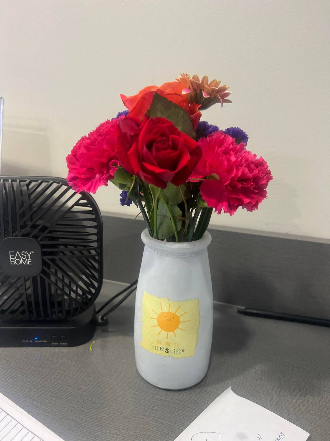 Niuri Perez’s colleague at Nova Southeastern University, Millicent Kelly, gave her these flowers at work on the same day Palm Beach County Sheriff’s deputies gave her grieving son a bicycle. Perez’s husband, the boy’s father, had died in June 2020.