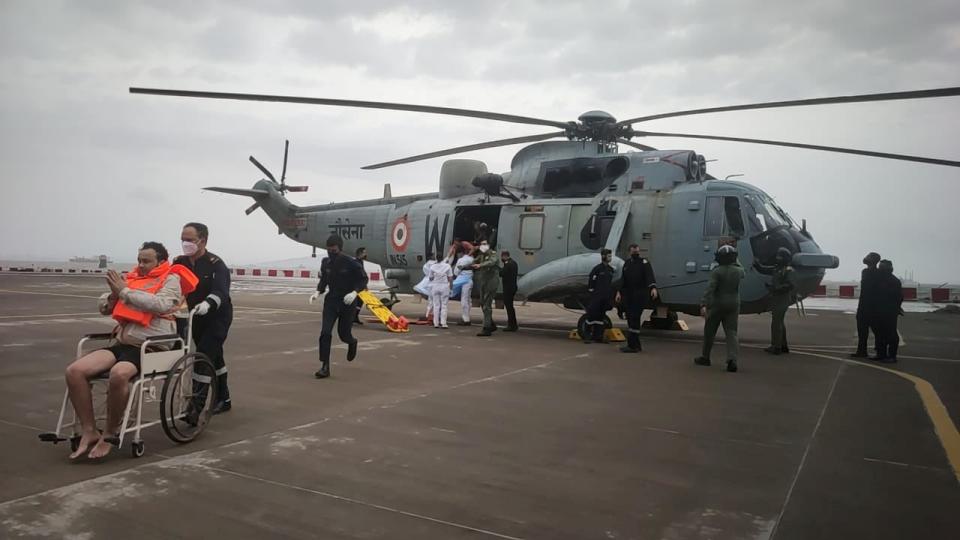 <p>People rescued by the Indian Navy  in the Arabian Sea, the cyclone is the most powerful to hit this part of the Indian Ocean in more than two decades</p> (via REUTERS)