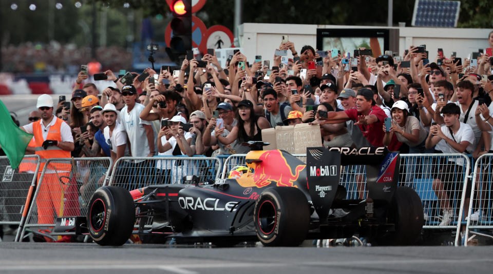 Mexican Formula 1 pilot Sergio Perez drives his F1 through the streets of the center of Madrid during an exhibition on July 15, 2023. (Photo by Thomas COEX / AFP) (Photo by THOMAS COEX/AFP via Getty Images)
