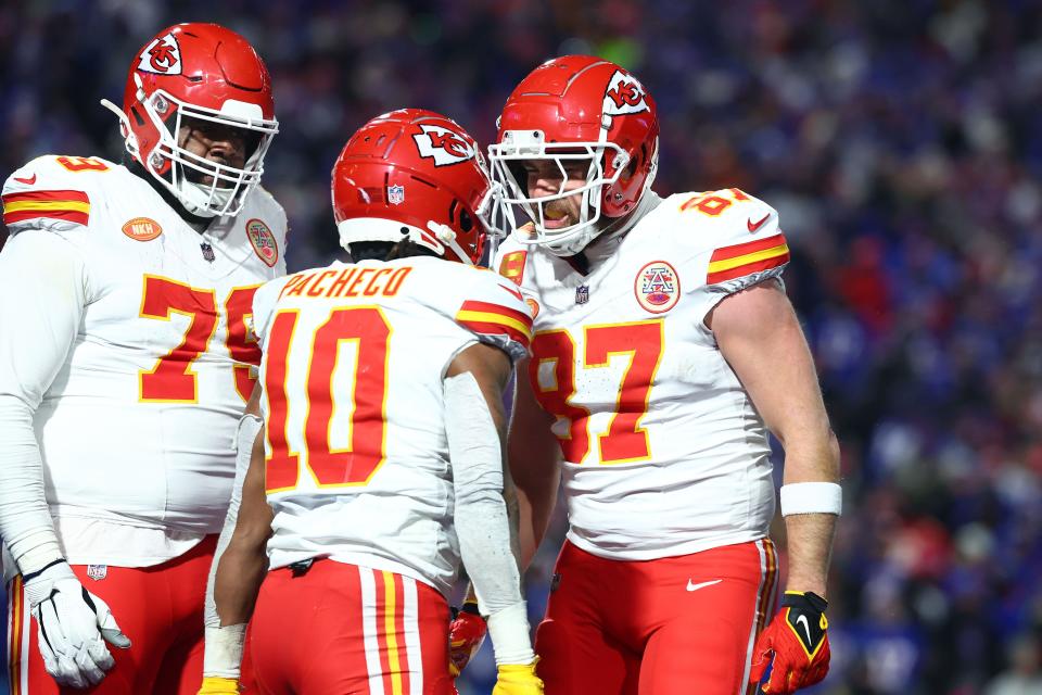 Chiefs tight end Travis Kelce (87) reacts with running back Isiah Pacheco (10) after a touchdown against the Bills during the second half of their AFC divisional round game at Highmark Stadium in Orchard Park, N.Y. on Jan. 21, 2024.