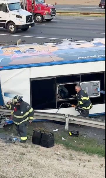 PHOTO: Emergency responders attend to the scene of a bus accident on the Turnpike in Woodbridge, N.J., Aug. 9, 2022. (Gary Lee Fortner)