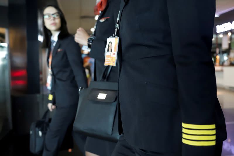 FILE PHOTO: The Captain Natalia Weiss of Brazilian Airline GOL walks at the airport with colleagues before take-off in the mark of International Women's Day, in Sao Paulo