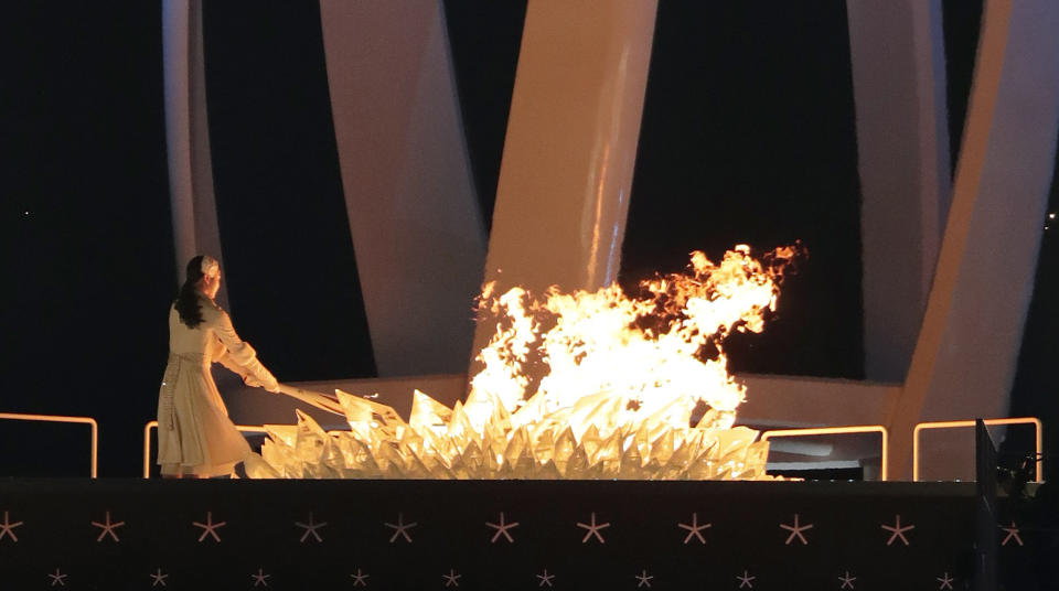 <p>Yuna Kim, former South Korean figure skater lights the Olympic cauldron during the opening ceremony of the 2018 Winter Olympics in Pyeongchang, South Korea, Friday, Feb. 9, 2018. (AP Photo/Julie Jacobson) </p>