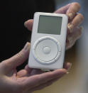 File - Apple's digital music player, iPod, is displayed after its introduction by Apple Computer Inc. chief executive officer Steve Jobs during a news conference Tuesday, Oct. 23, 2001 in Cupertino, Calif. Although it wasn’t the first of its kind, the iPod changed the way people thought about digital music players just like Jimi Hendrix changed the way thought about the guitar. (AP Photo/Julie Jacobson, File)