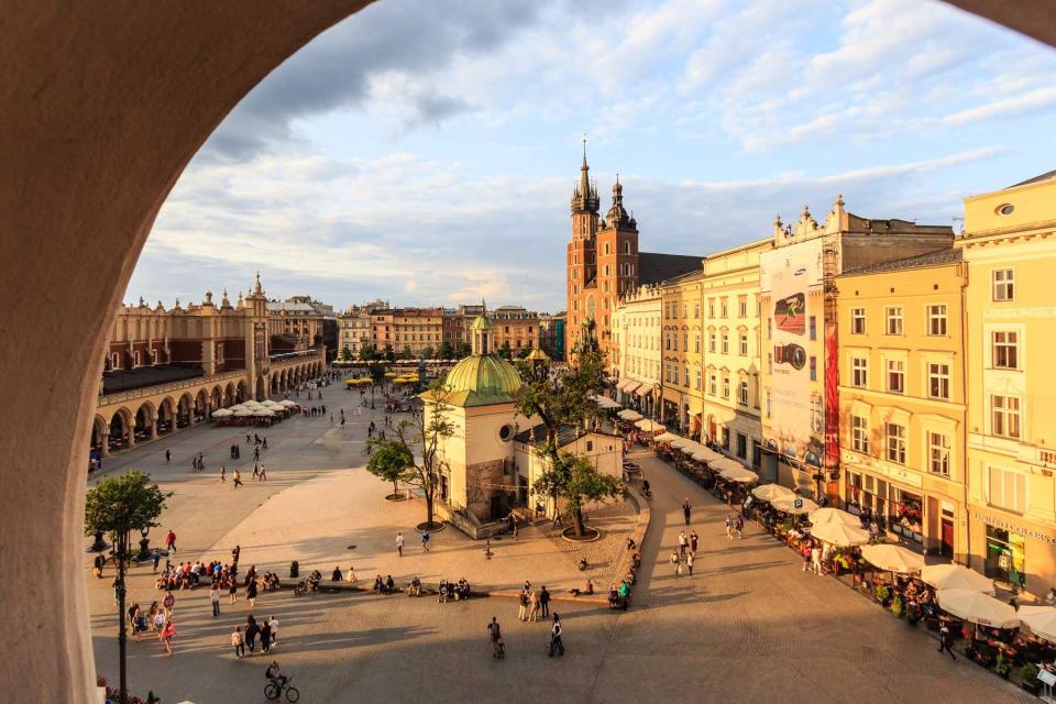 View through an archway to a public square in Krakow, Poland, voted one of the best cities in the world