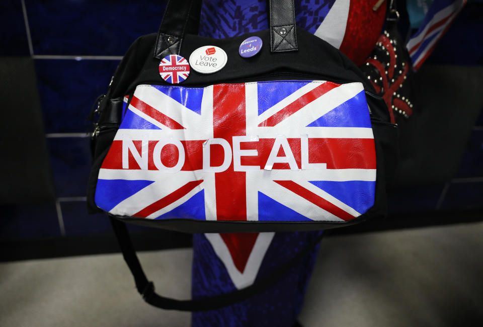 A Brexit supporter wears an Union Jack 'No Deal' handbag during a rally at Featherstone Working Man's Club, while on the European Election in Pontefract, West Yorkshire. Picture dated: Monday May 13, 2019. Photo credit should read: Isabel Infantes / EMPICS Entertainment.