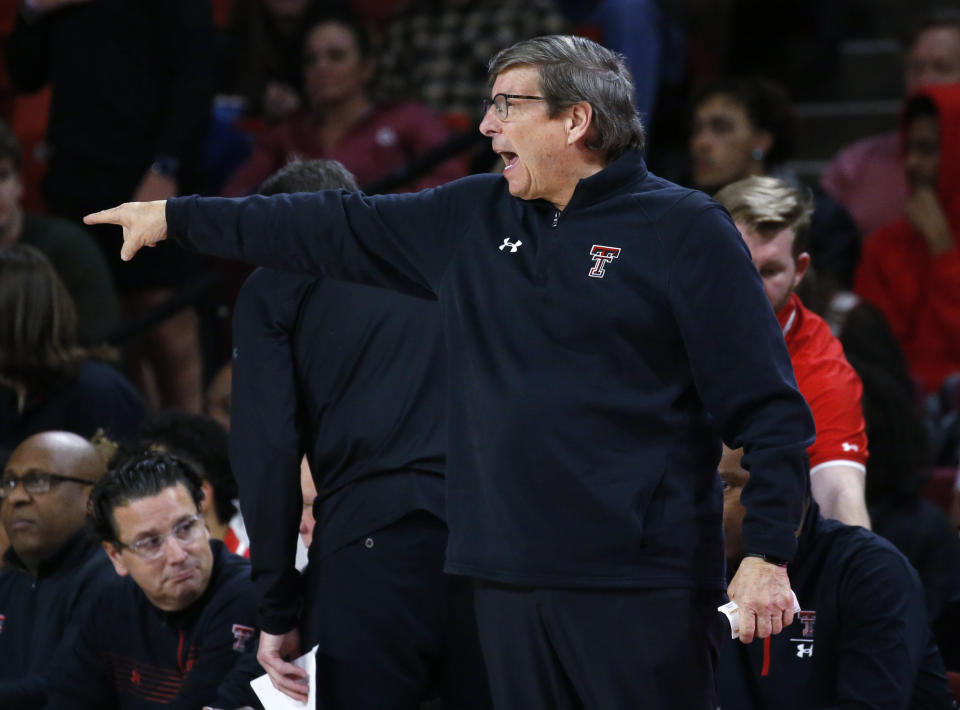 Texas Tech coach Mark Adams yells to the team during the second half of an NCAA college basketball game against Oklahoma ob Wednesday, Feb. 9, 2022, in Norman, Okla. (AP Photo/Garett Fisbeck)