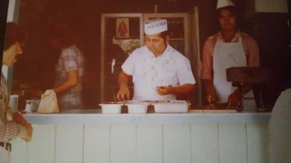 Pedro Rodriguez's family making tacos at a stand in Tijuana. (Courtesy of Pedro Rodriguez)