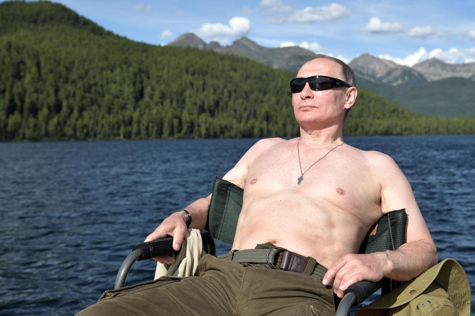 Russian President Vladimir Putin relaxes during&nbsp;a hunting and fishing trip on Aug. 1-3, 2017, in the republic of Tyva in southern Siberia, in this photo released by the Kremlin.