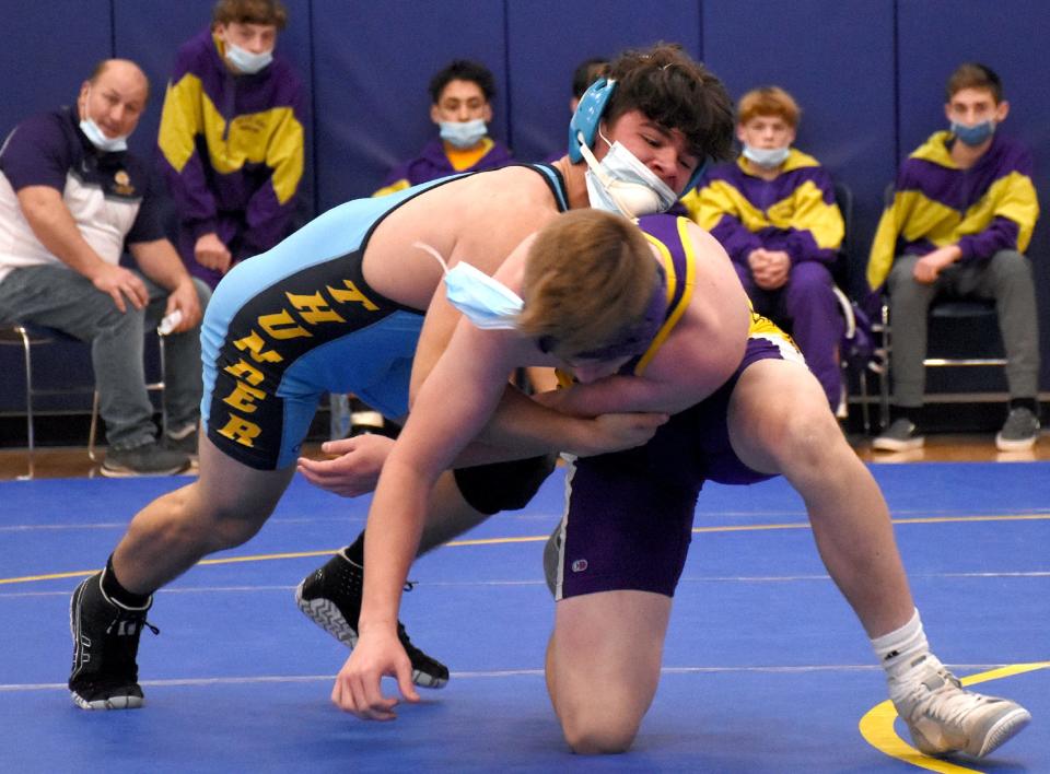 Central Valley Academy's Cole Wheet (left), pictured grappling with Anthony Amidon of Holland Patent at the Dominick DeSiato Duals in December, won both of his matches Tuesday and helped the Thunder advance to Section III's Division II dual meet tournament championship.