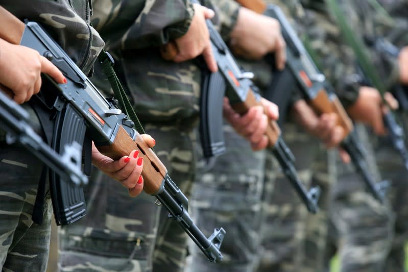 FILE PHOTO: A group of uniformed volunteers called Stajerska Varda (Stajerska Guard) holds regular exercises near Slovenian border with Croatia in Kostel