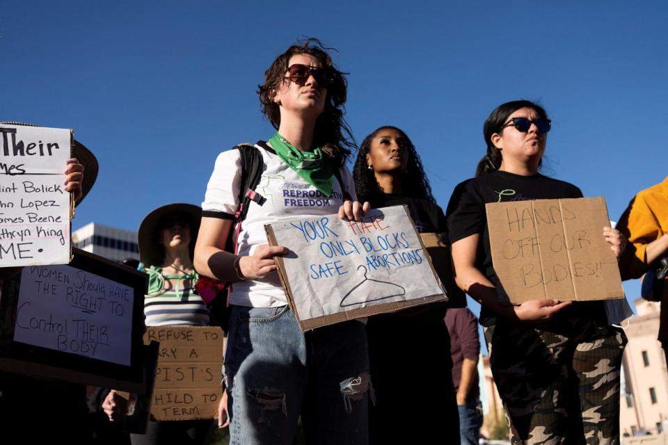 PHOTO: Protesters take part in a small rally led by Women's March Tucson after Arizona's Supreme Court revived a law dating to 1864 that bans abortion in virtually all instances, in Tucson, Arizona, on April 9, 2024.  (Rebecca Noble/Reuters)