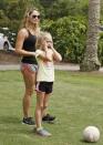 FootGolfer Kinsley Wooten, 8, looks down the first fairway with her mother Brandi at Largo Golf Course in Largo, Florida April 11, 2015. REUTERS/Scott Audette