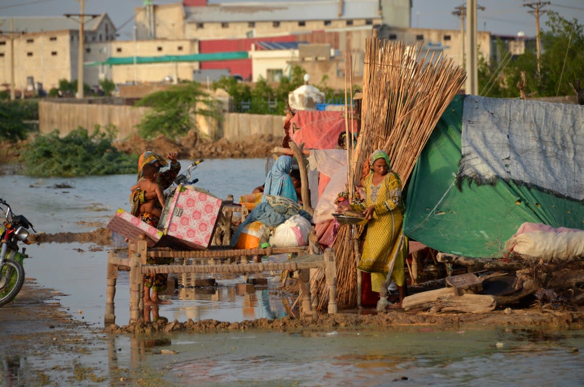Flash flooding from the heavy rains has washed away villages and crops in Pakistan.   (AP)