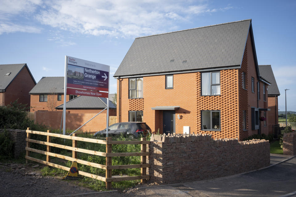 A semi-completed housing estate on former farmland, a landscape that is fast changing to residential use by housing developer Taylor Wimpey at Netherton Grange, Youngwood Lane, Nailsea, on 7th November 2021, in Nailsea, North Somerset, England. Nearly 170 homes are being built here on the edge of Nailsea in rural North Somerset after detailed plans were approved. (Photo by Richard Baker / In Pictures via Getty Images)