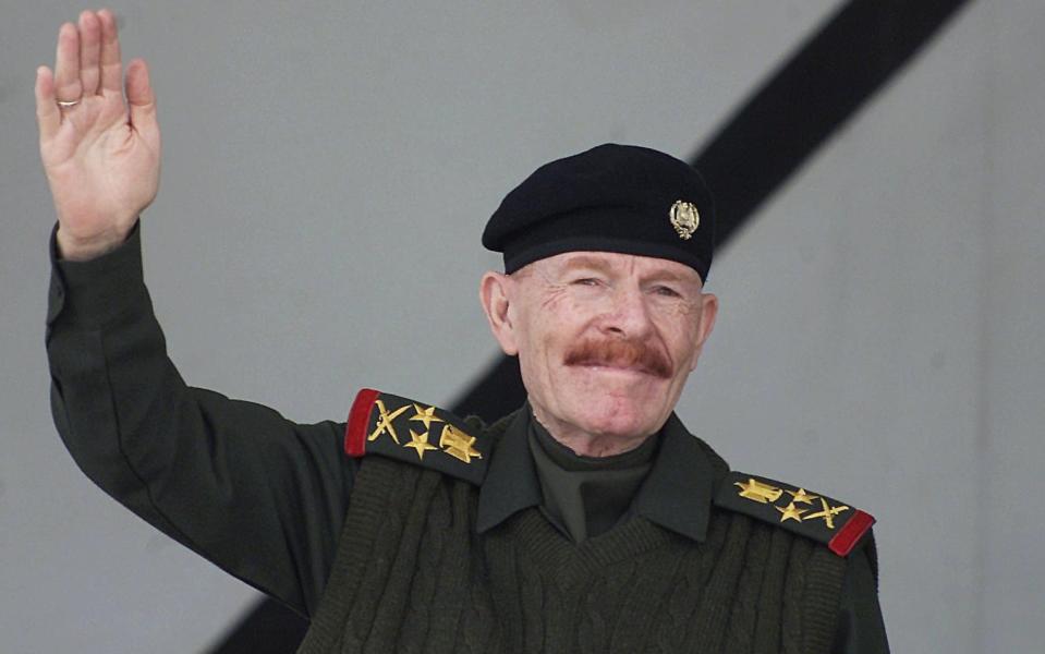 Izzat Ibrahim al-Douri at a military parade in Mosul in 2003 - Awad Awad/AFP via Getty Images