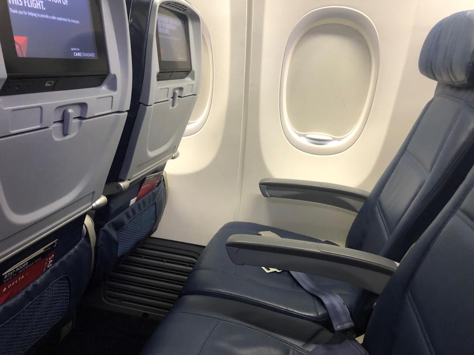 A treat on my Delta flight: two empty seats. The airline is blocking middle seats through March 30.