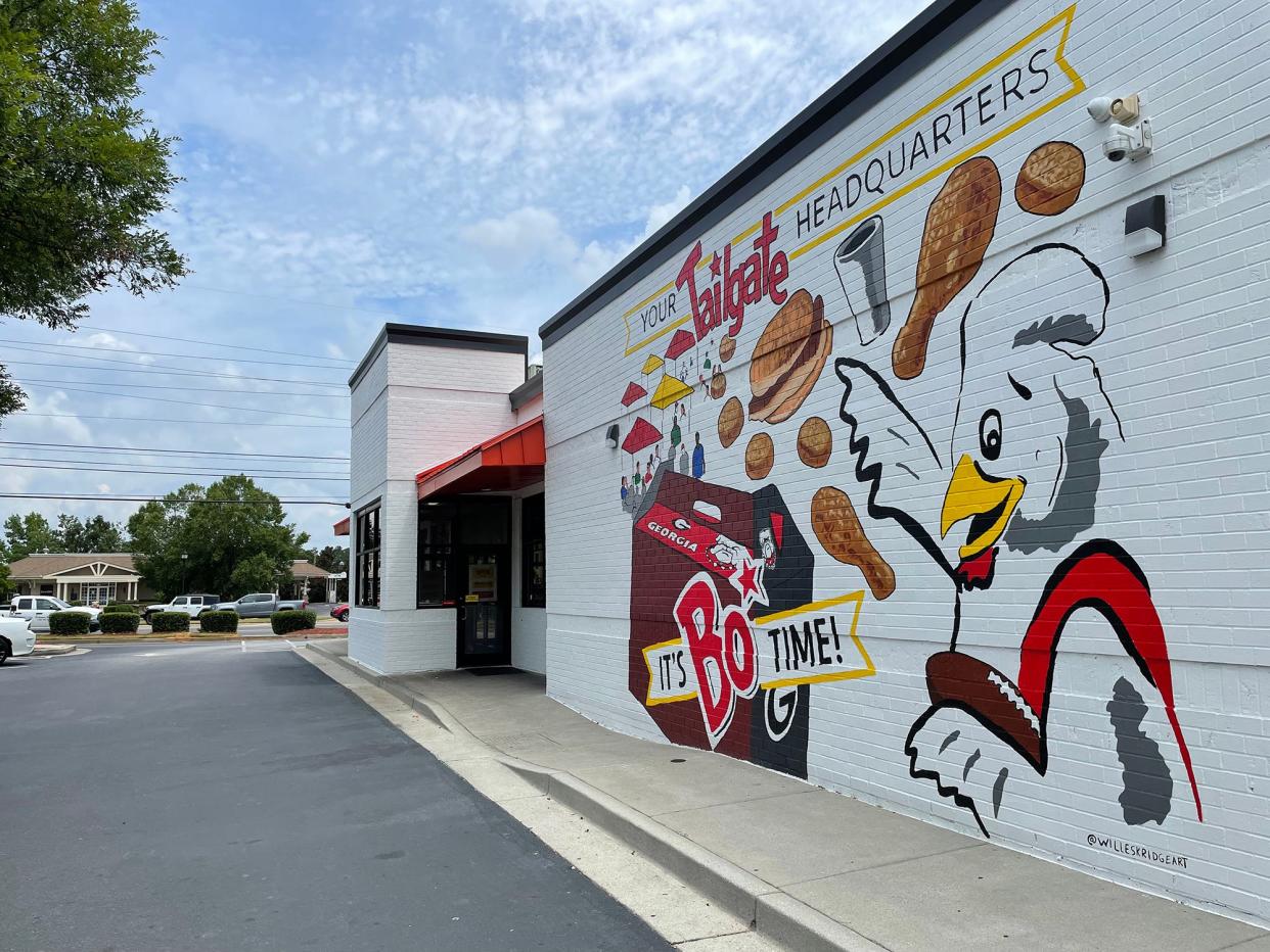 The first outdoor mural by Athens artist Will Eskridge can be seen in the drive-thru at the Atlanta Highway Bojangles location. Eskridge and his brother, Rame, completed the mural during the heat wave of June 2022.