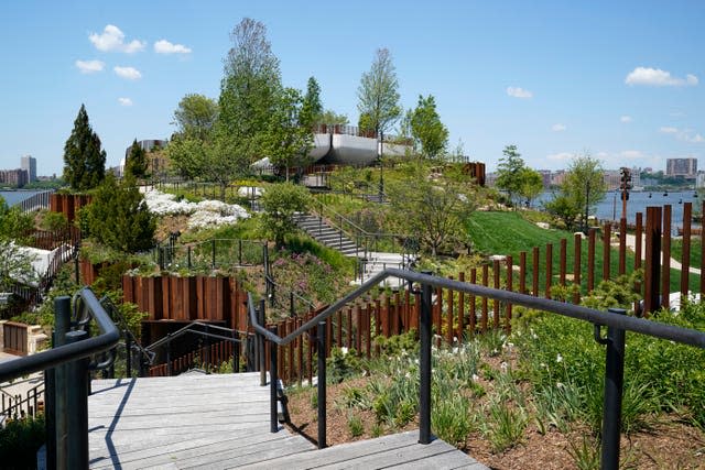 A stairway leads to one of the highest points of Little Island, a new Hudson River Park in New York