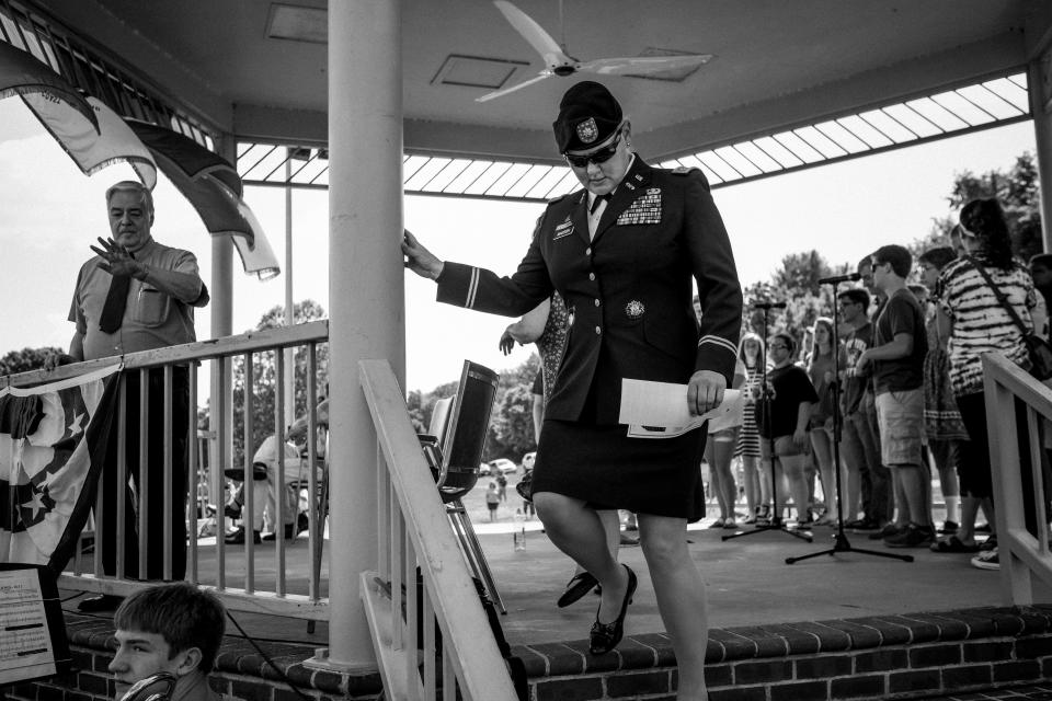 Lt. Col. Alicia Masson, the former commander of the Army base in Radford, exits the stage after giving the keynote address at a Memorial Day celebration in Bisset Park on the New River. (Photo: Ashley Gilbertson/VII Photo, special to ProPublica)