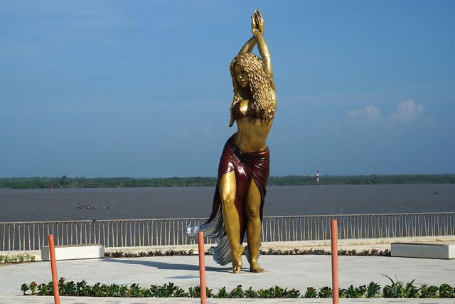 <p>STR/AFP via Getty Images</p> Statue of Shakira in Barranquilla, Colombia