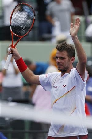 Stanislas Wawrinka waves to the crowd after his match against Daniel Gimeno-Traver (not pictured) on day six of the Sony Open at Crandon Tennis Center. Wawrinka won 6-0, 3-6, 6-3. Mandatory Credit: Geoff Burke-USA TODAY Sports