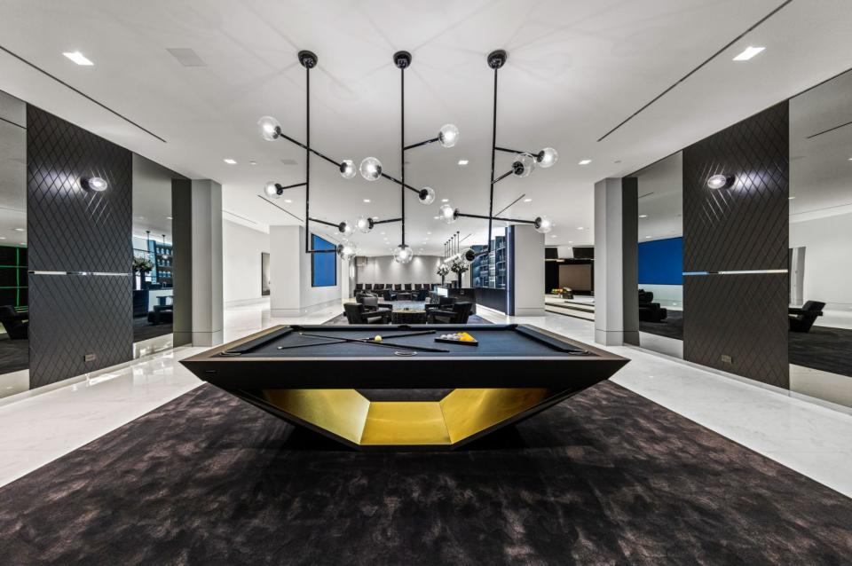 a pool table in a games room in mansion The One Bel Air