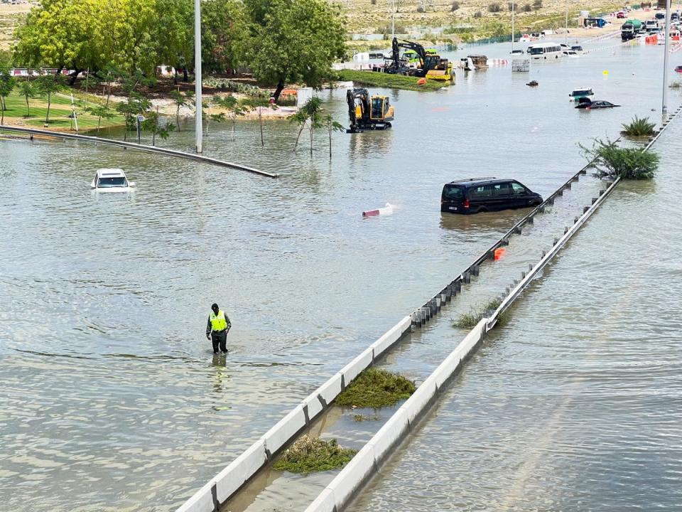 Cars are stuck on a flooded road after a rainstorm hit Dubai, in Dubai, United Arab Emirates, April 17, 2024 (REUTERS)